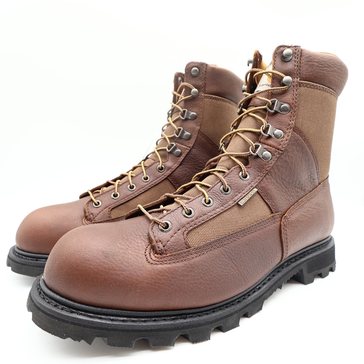 Carhartt brown leather and canvas lace-up logger boots with speed hooks, three-quarter view