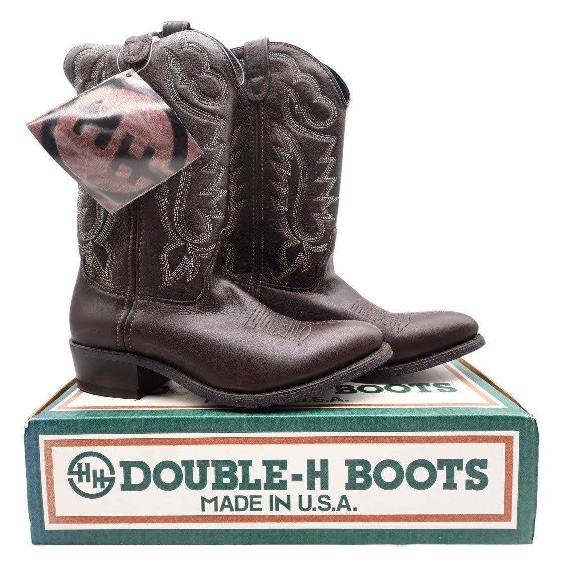 Pair of dark brown Double-H western boots with contrast stitching displayed on a Double-H shoebox