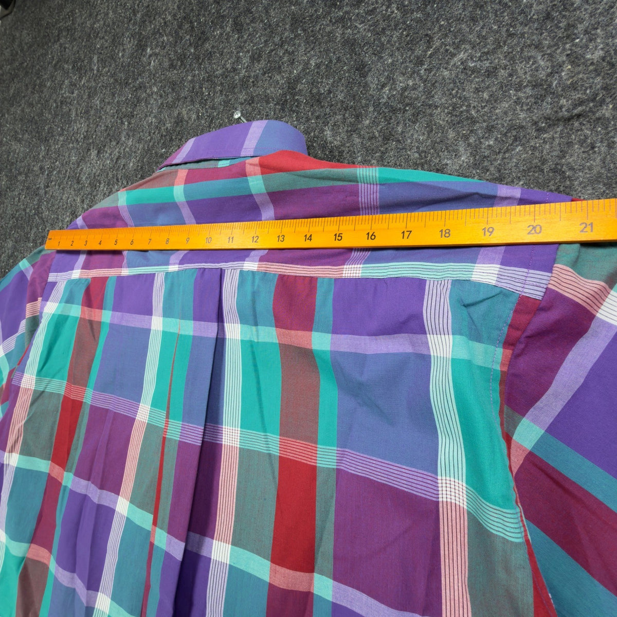 Purple, turquoise and red plaid 417 by Van Heusen shirt, back shoulder width shown with ruler