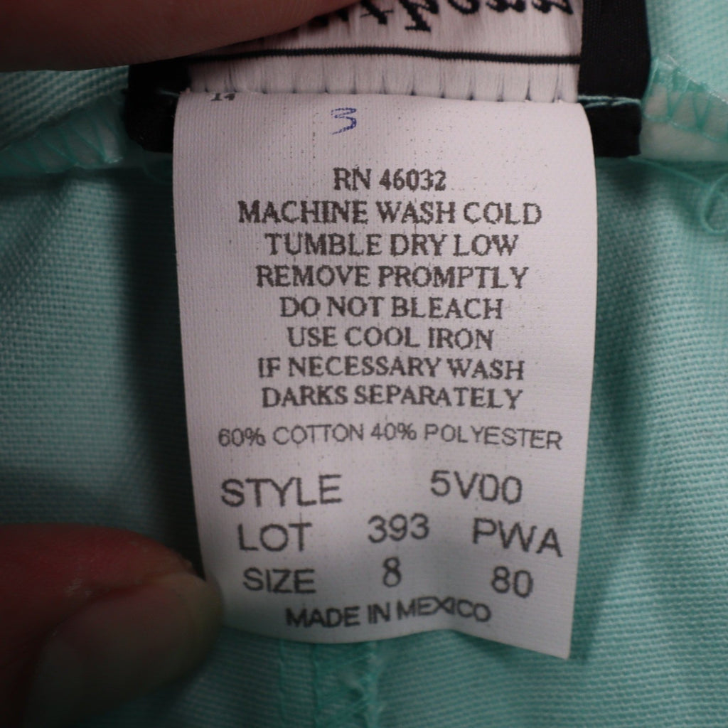 Aqua Southern Lady pleated shorts, English fabric care label