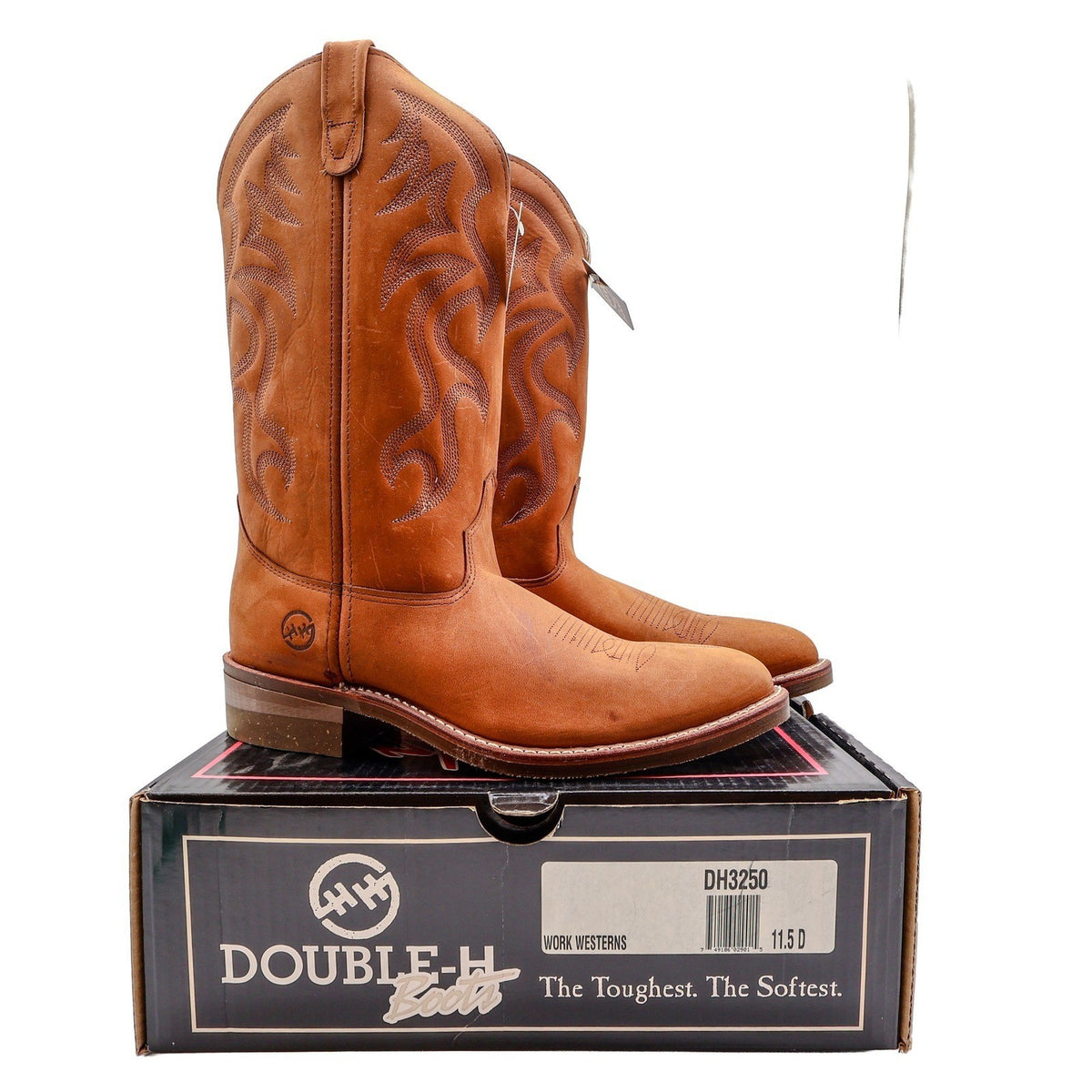 Pair of tan Double-H western boots with decorative shaft stitching displayed on a Double-H shoebox