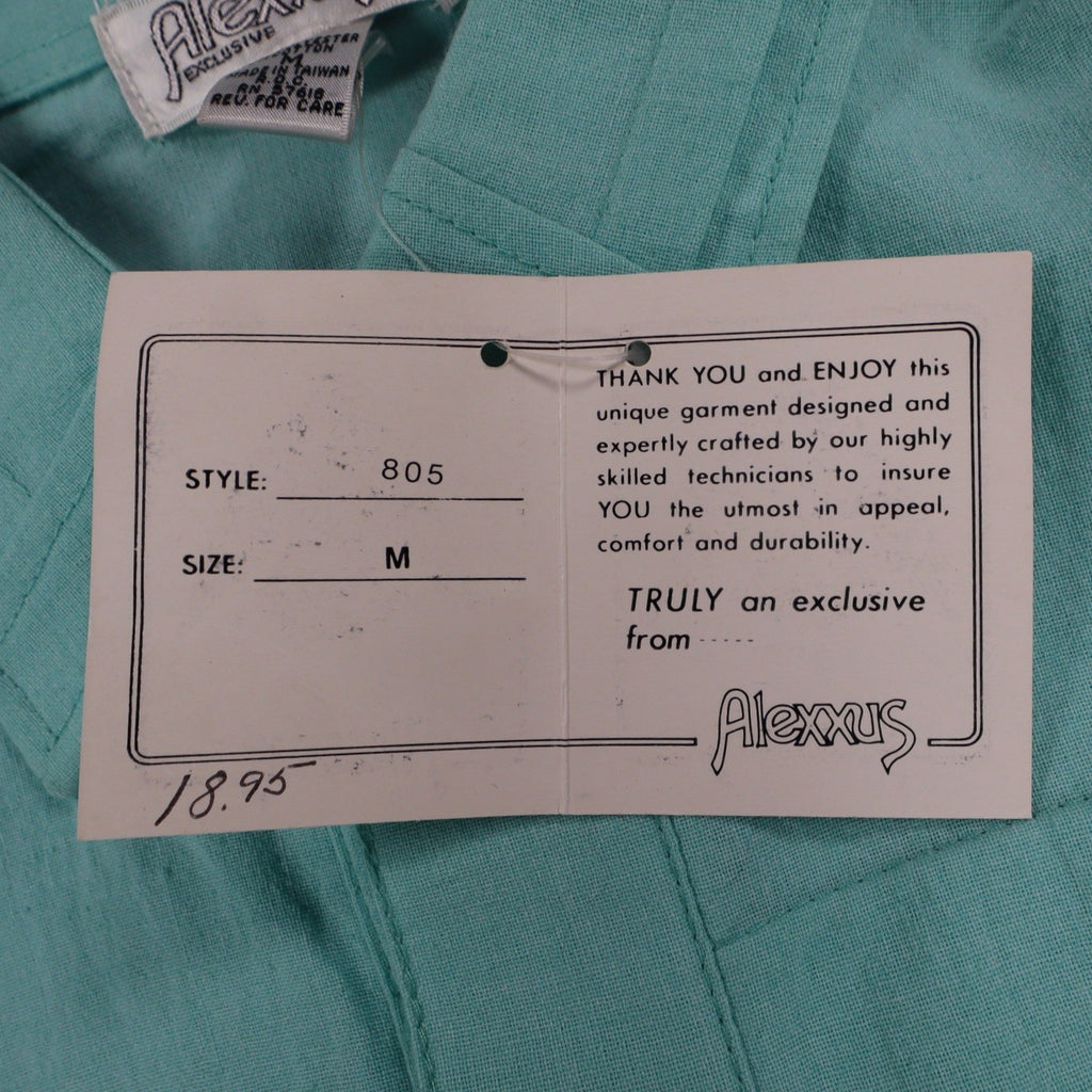 Close-up of size and product information on a Alexxus hangtag