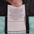 Aqua Southern Lady pleated shorts, French fabric care label