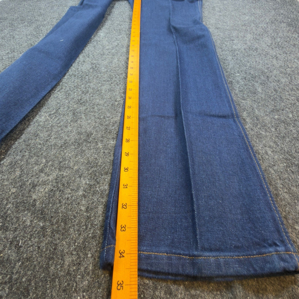 Blue Lady Maverick jeans with elastic side waistband, inseam ruler view