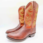 Three-quarter view of rust-brown Double-H western boots with yellow shaft stitching with toes pointing left