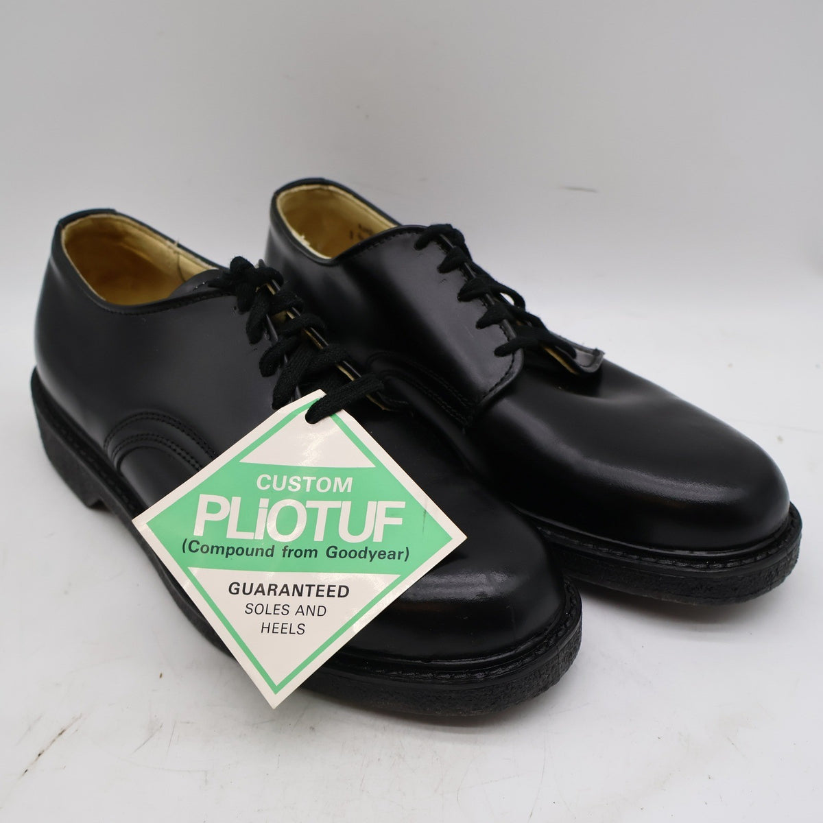 Black Cedar Crest plain-toe lace-up shoes, angled pair with tag