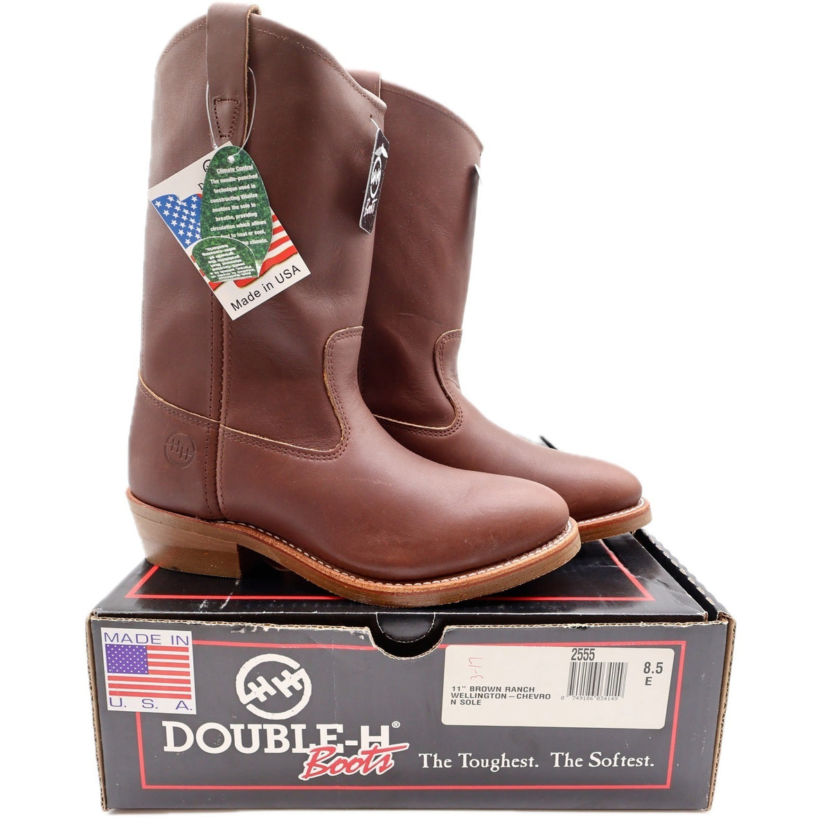 Pair of brown Double-H pull-on boots with tan soles displayed on a Double-H shoebox