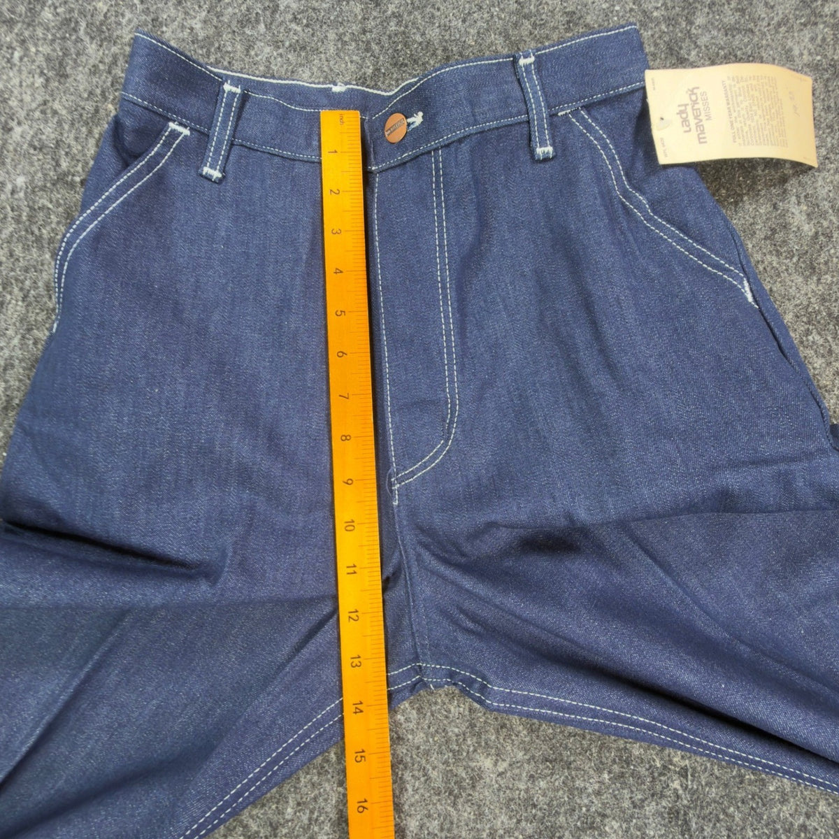 Blue Lady Maverick jeans with contrast stitching, front rise ruler view