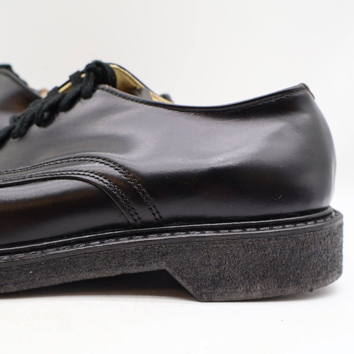 Black Cedar Crest plain-toe lace-up shoes, heel and side close-up