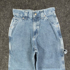 Close-up of the front of light blue Lee wide-leg carpenter jeans
