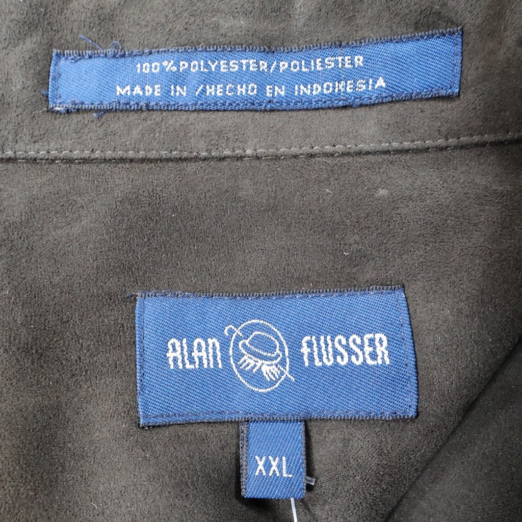 Close-up of the Alan Flusser brand, size and fabric-content labels inside a brown shirt jacket
