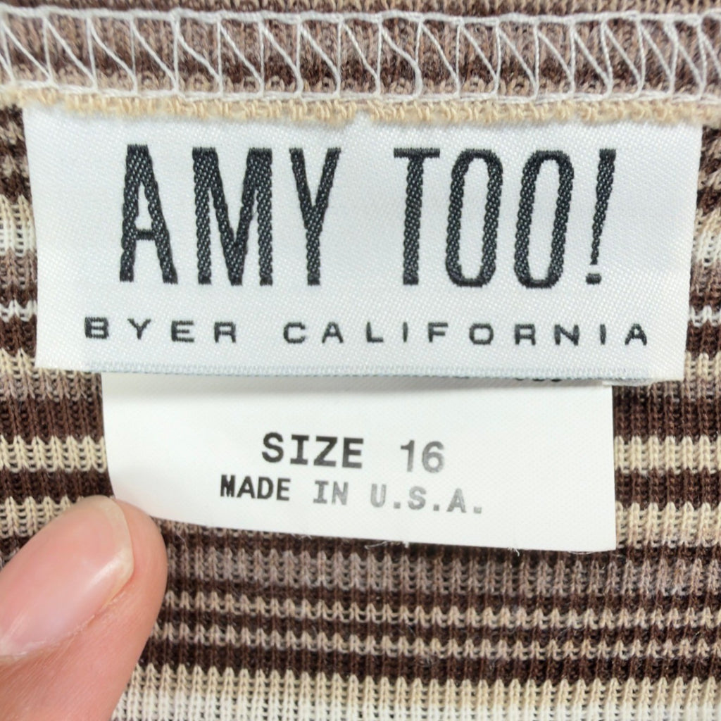 Close-up of the Amy Too brand and size labels inside the striped top