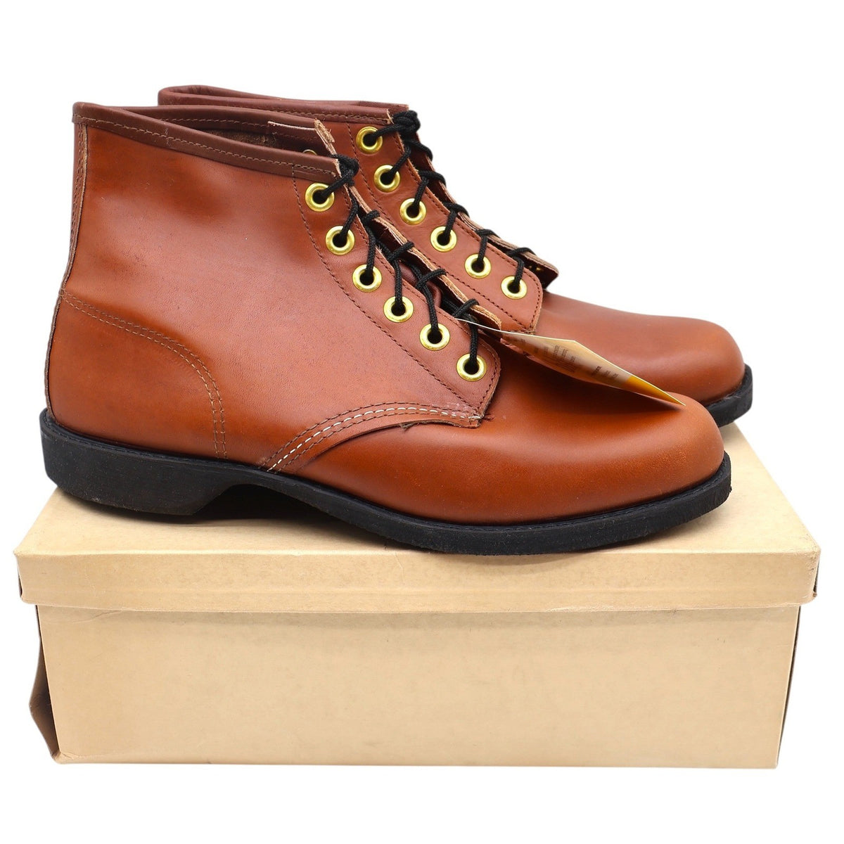 Reddish-brown Cedar Crest lace-up ankle boots, pair on plain brown shoebox