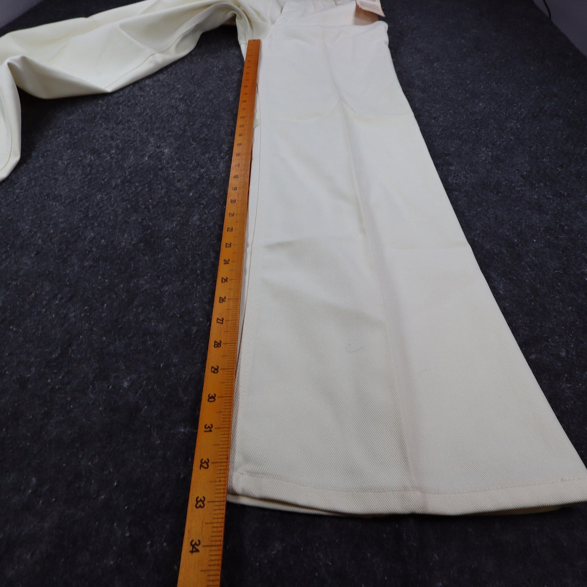 Ivory Lady Maverick flared pants, inseam ruler view