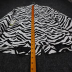 Ruler along the back length of black and white zebra-print Erin London blazer