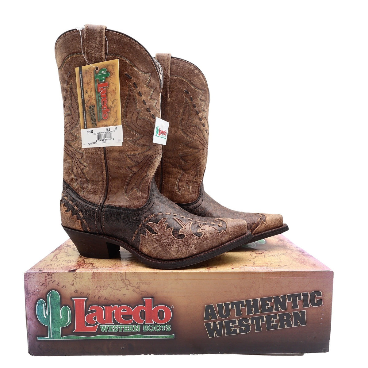Pair of tan and dark brown Laredo cowboy boots with decorative stitching displayed on a Laredo shoebox