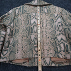 Tan and green Anna Cai snakeskin-print cropped jacket, measuring tape along the back length