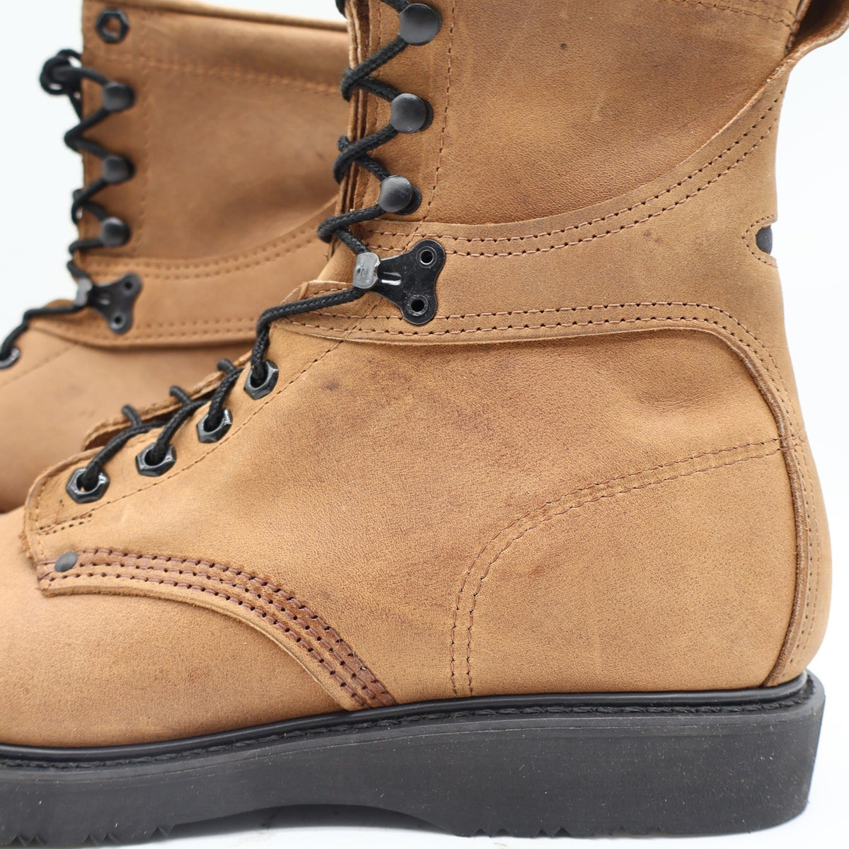 Tan Carolina lace-up work boots, close-up of side stitching and heel