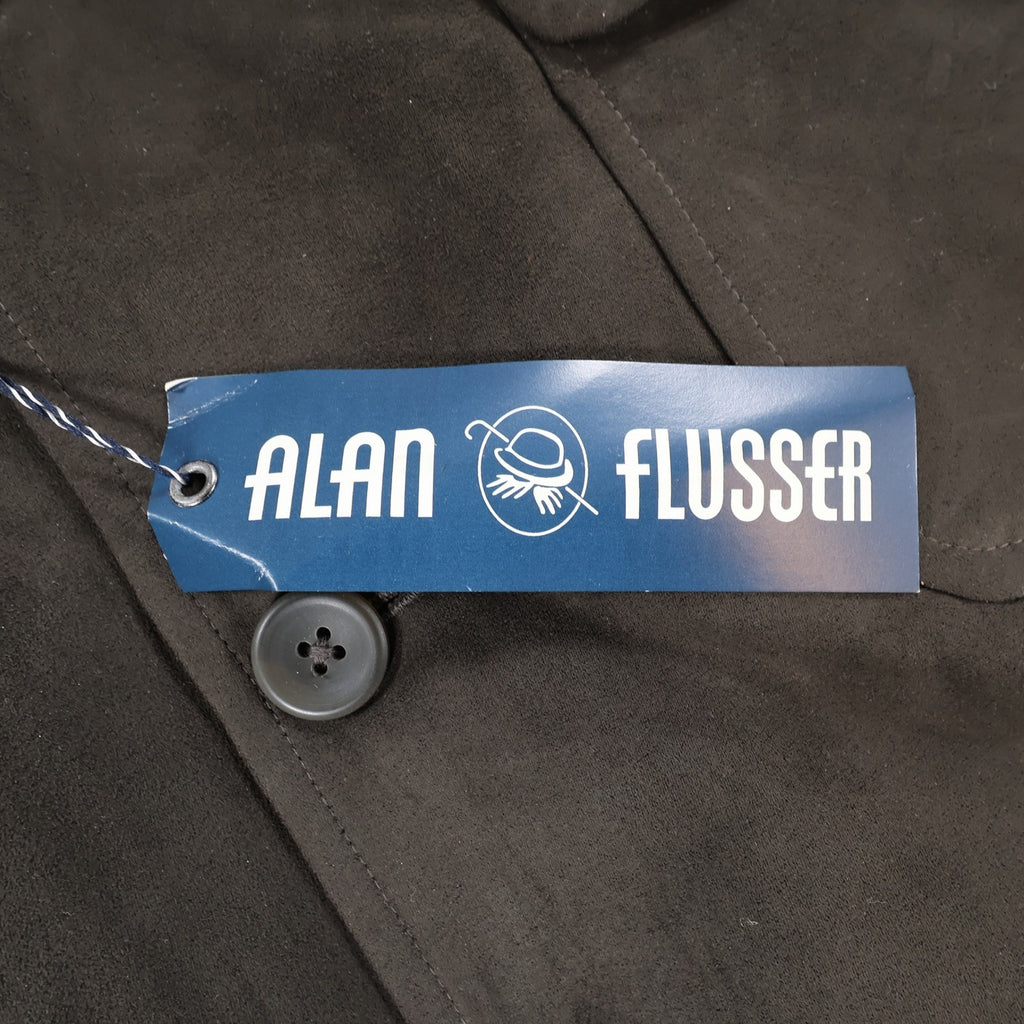 Close-up of the Alan Flusser logo side of the hangtag