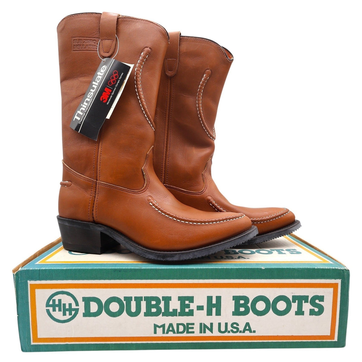 Pair of brown Double-H moc-toe pull-on boots with black heels displayed on a Double-H shoebox