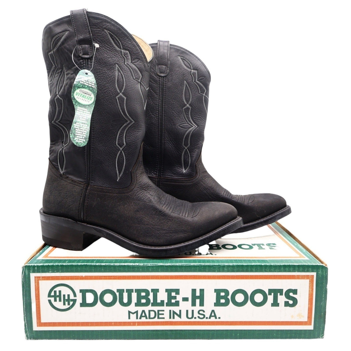 Black Double-H western boots with light shaft stitching, pair with hangtag on Double-H box