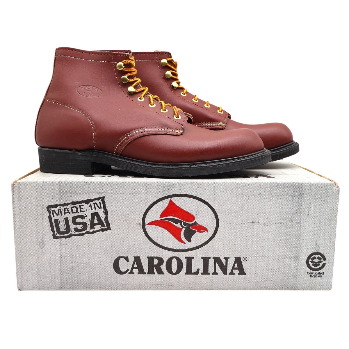 Reddish-brown Carolina ankle boots, pair on Carolina shoebox