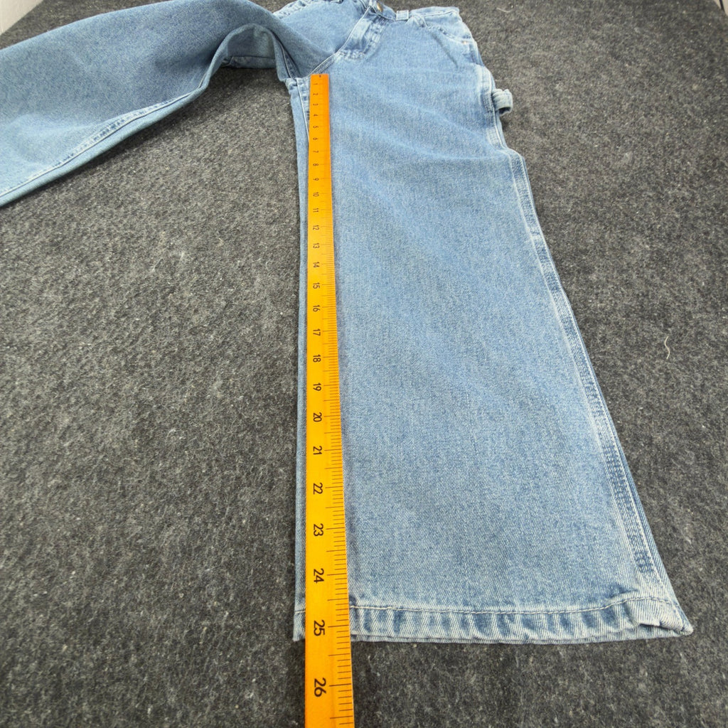 Ruler alongside the inner leg of light blue Lee wide-leg carpenter jeans
