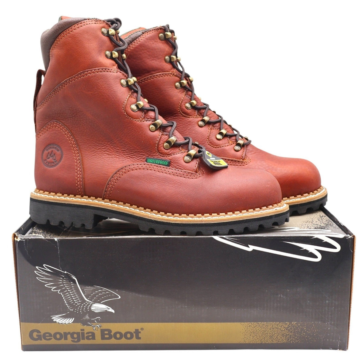 Pair of reddish-brown Georgia Boot lace-up boots displayed on a Georgia Boot shoebox