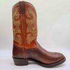 Side profile of a rust-brown Double-H western boot with the toe pointing right