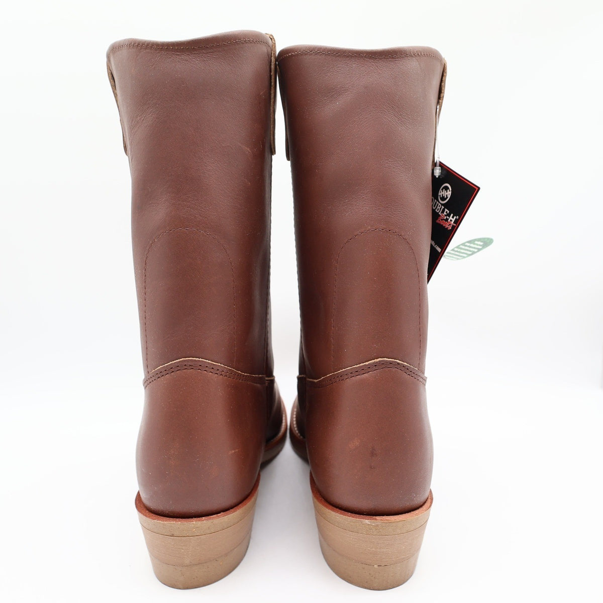 Rear view of brown Double-H pull-on boots with tan soles, showing heel seams and collars