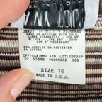 Close-up of the fabric-content, care and size label inside the striped Amy Too top