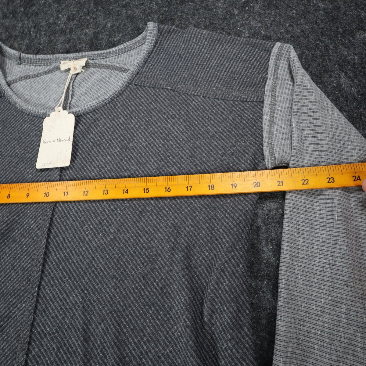 Gray Hem & Thread top with pale sleeves and black lace cuffs, chest ruler view