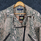 Tan and green Anna Cai snakeskin-print cropped jacket, close-up of notched collar, snaps and front zipper