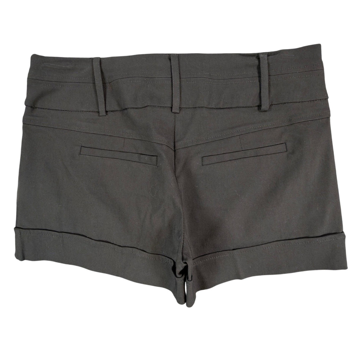 Back view of black My Michelle pleated shorts with cuffed hems