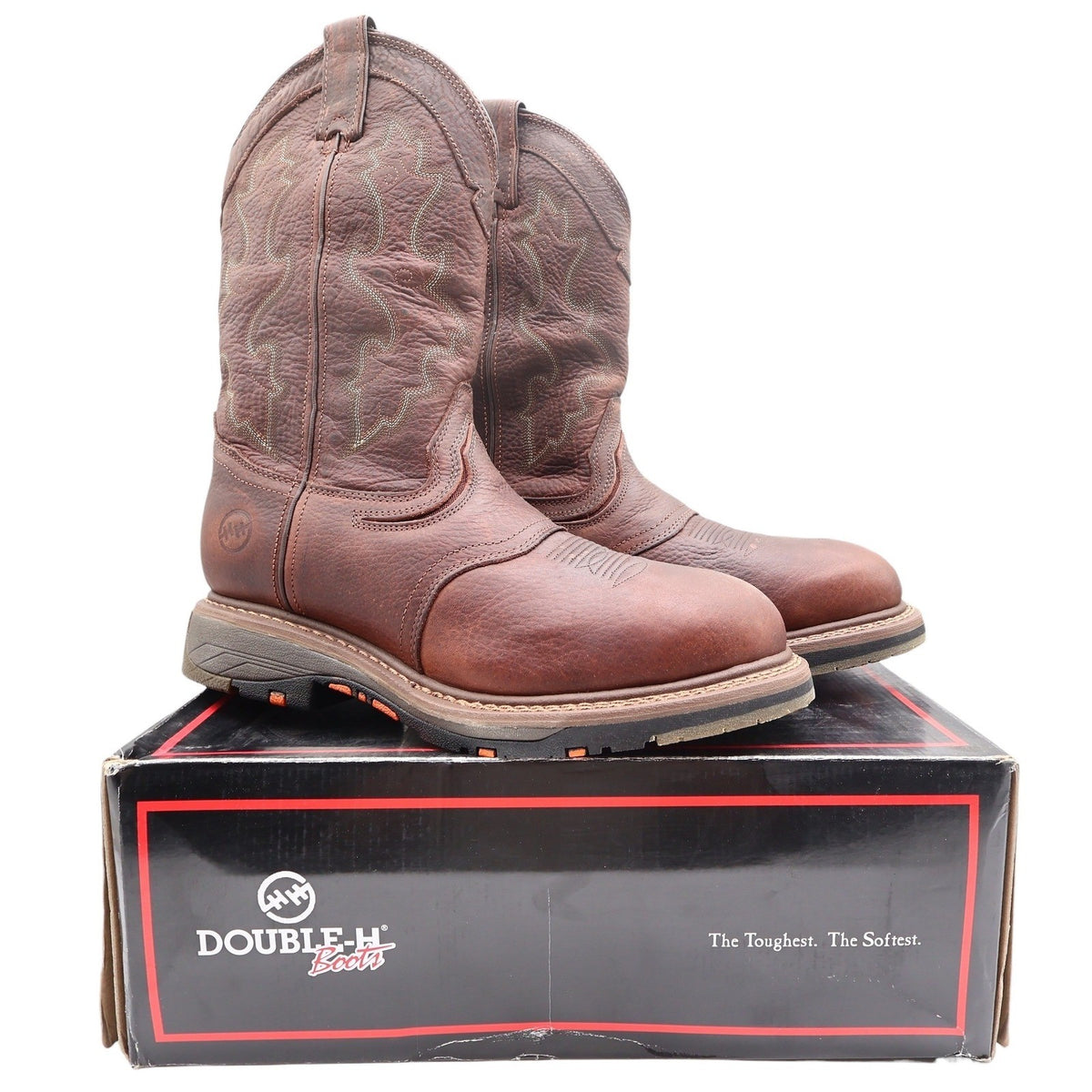 Pair of brown Double-H western boots with decorative stitching displayed on a Double-H shoebox