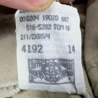 Close-up of production codes and a garment-workers union mark
