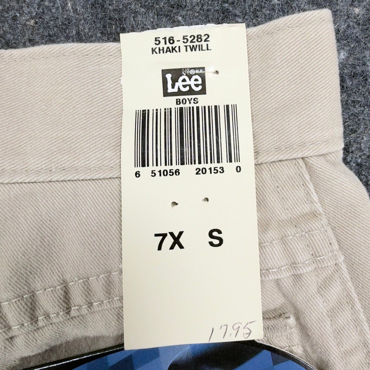 Close-up of a Lee size and barcode tag