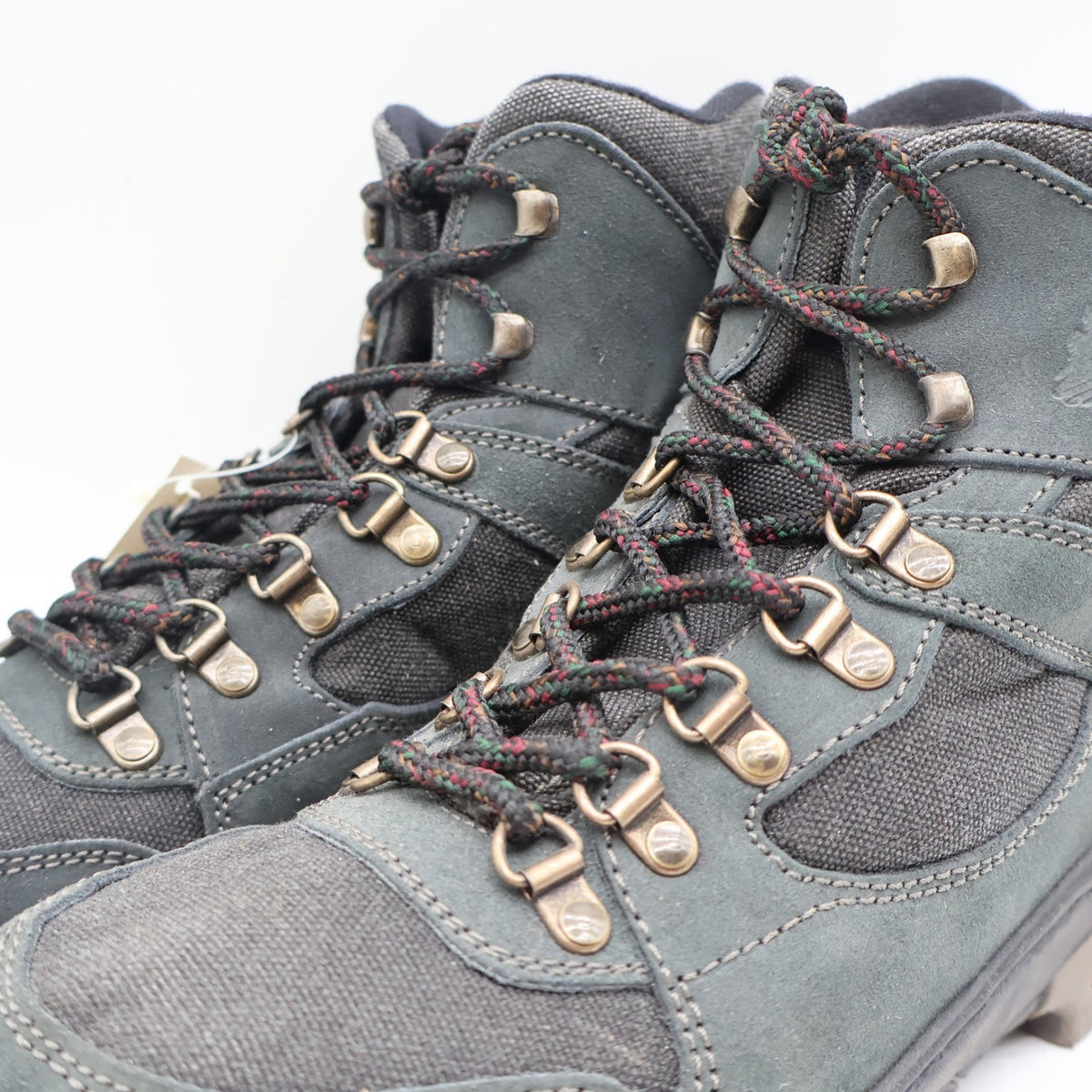 Gray Lake of the Woods hiking boots with Cordura panels, laces and metal hooks close-up