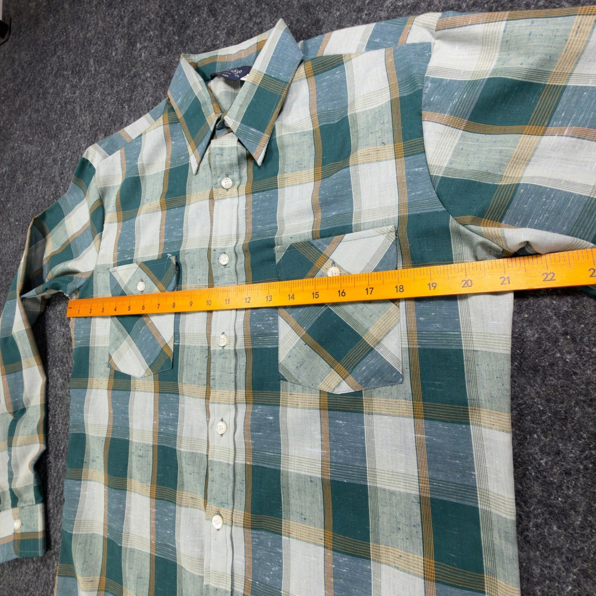 Green and cream Cambridge plaid shirt, chest ruler view