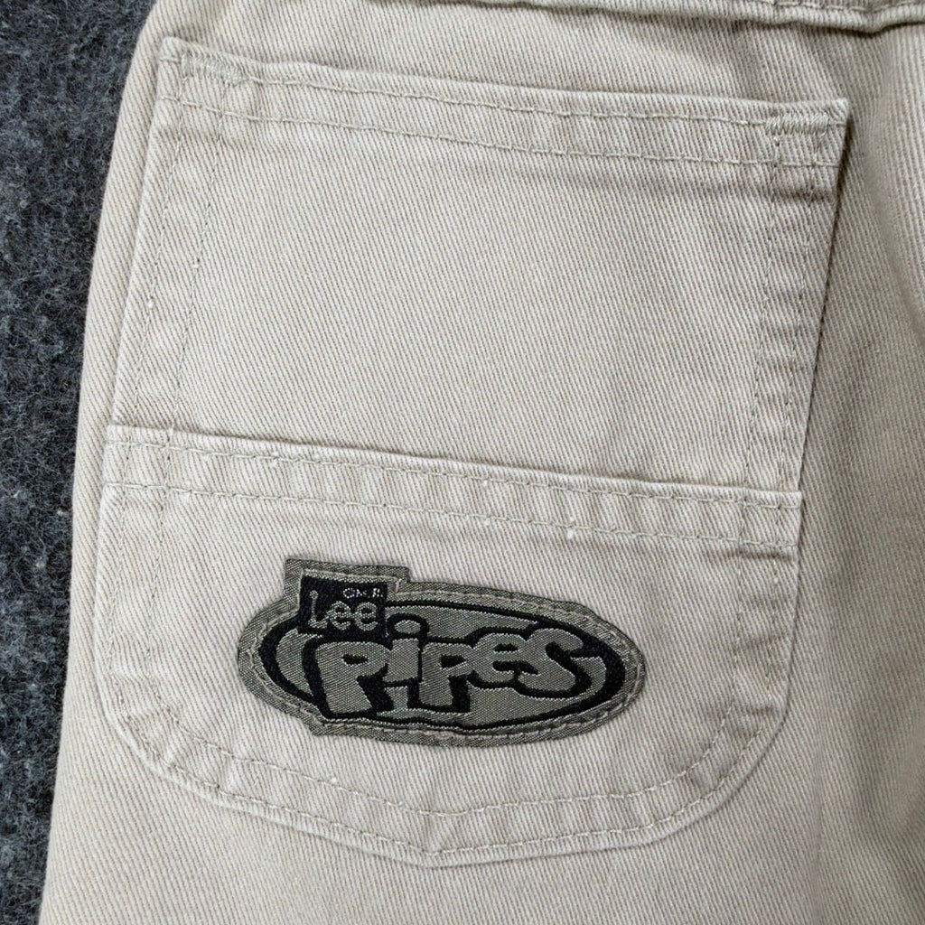 Close-up of a rear patch pocket with a Lee Pipes logo