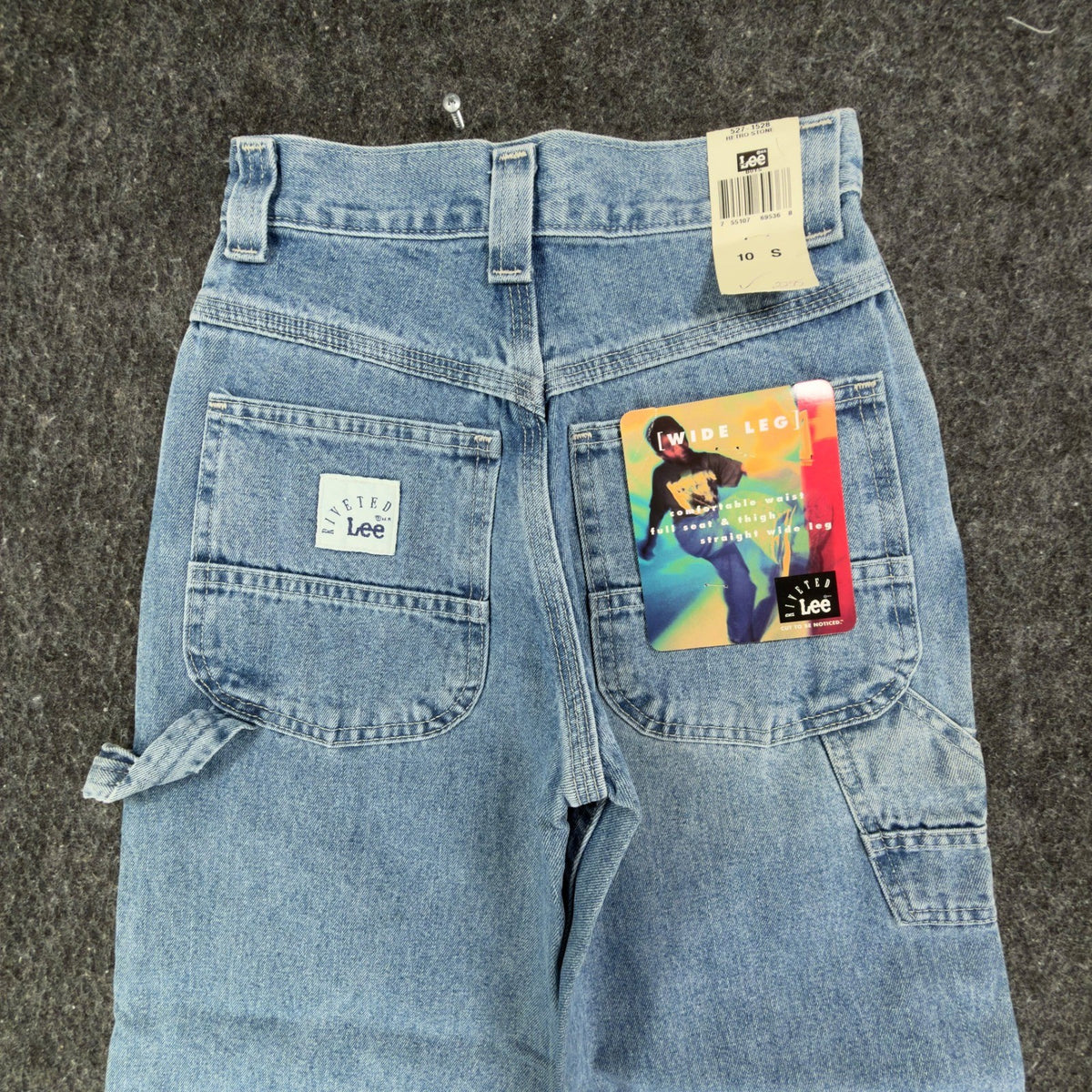 Close-up of the back of light blue Lee wide-leg carpenter jeans