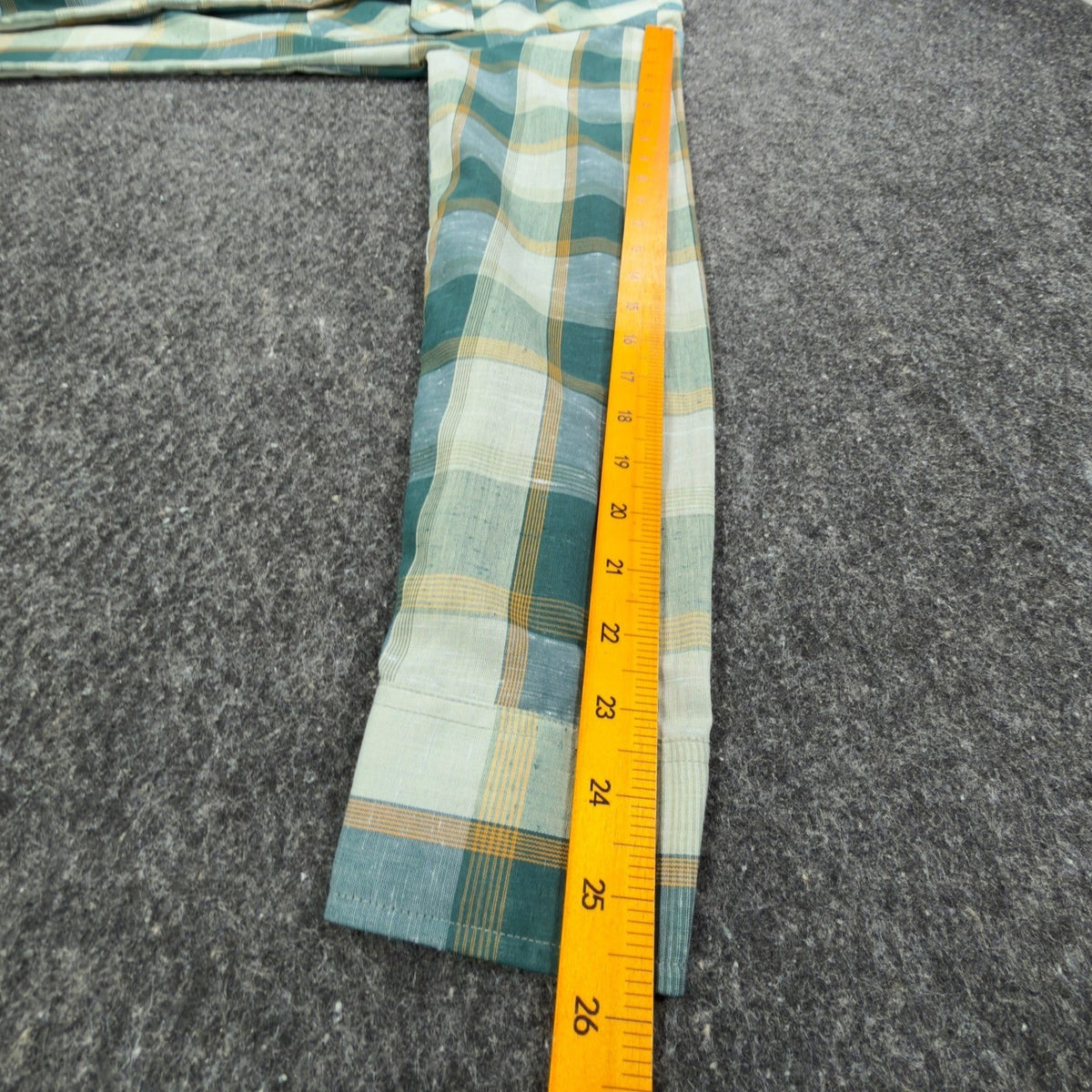 Green and cream Cambridge plaid shirt, sleeve ruler view