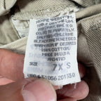 Close-up of care, fabric-content and size information on an interior label
